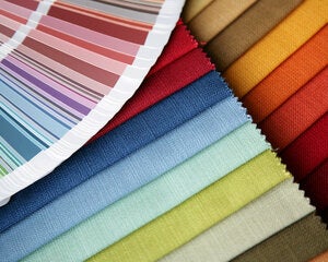 Color swatches on paper and fabric.
