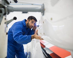 composite designer reviewing the work
