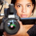 Woman holding video camera