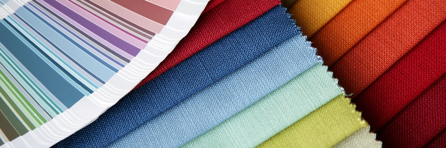 Color swatches on paper and fabric.