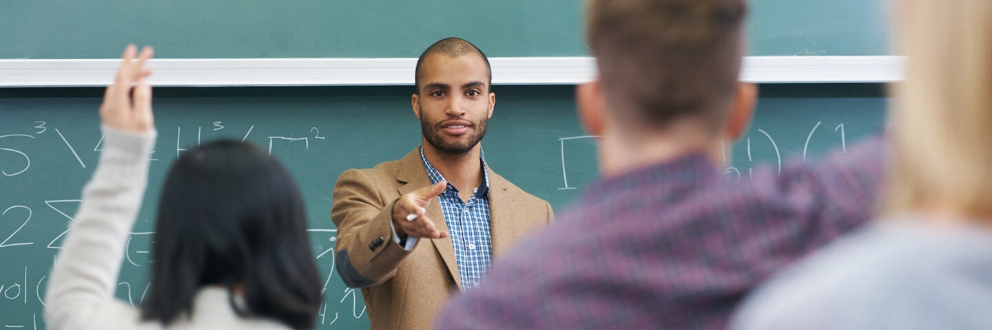 male teacher in classroom