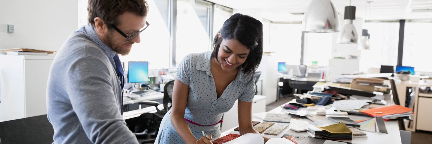 Interior Architects reviewing documents