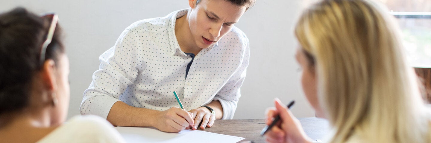 Writers at a writer's table