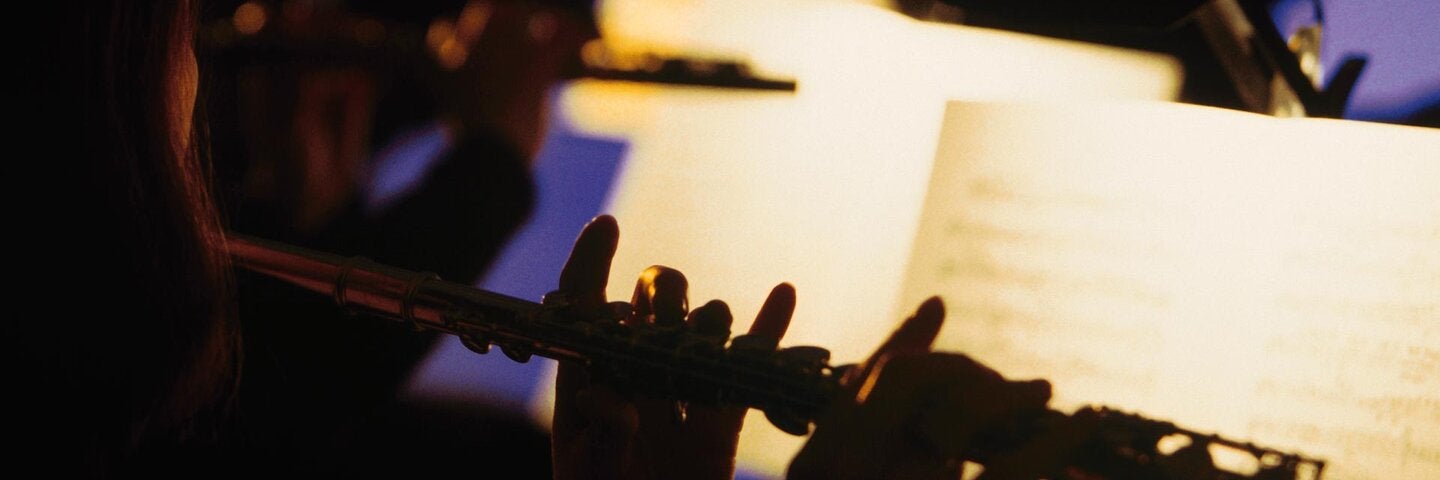 flute player in orchestra