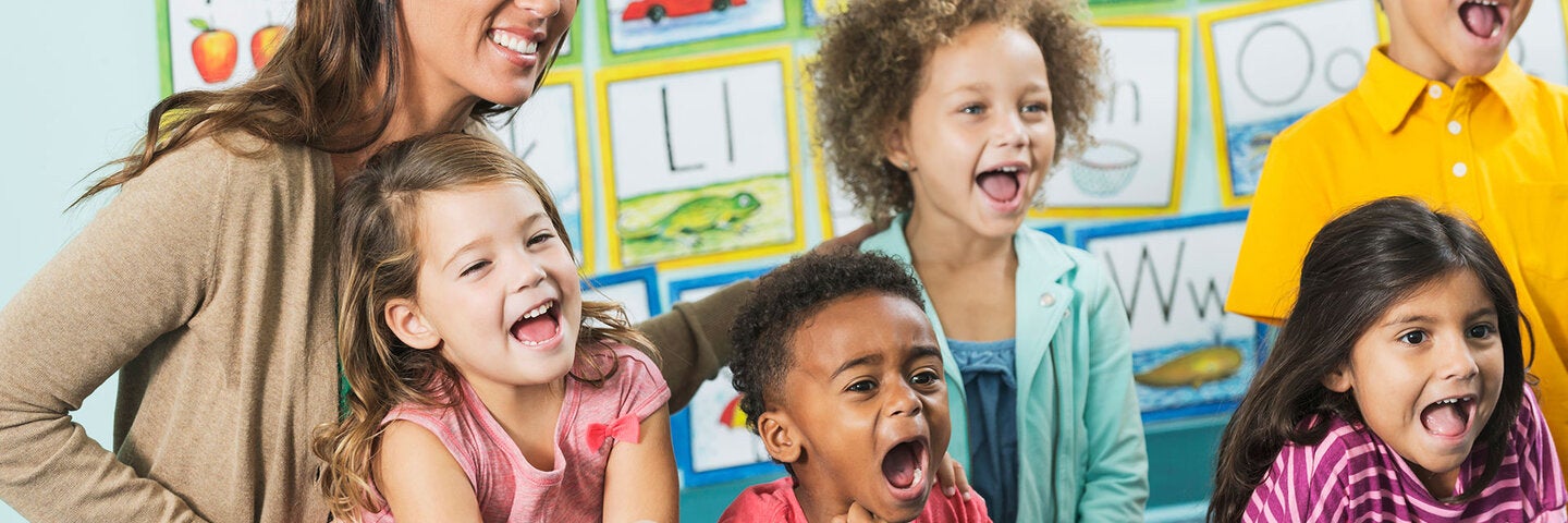 Teacher with kindergarten students
