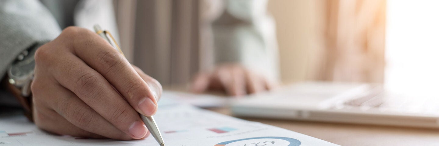 Business person analyzing data