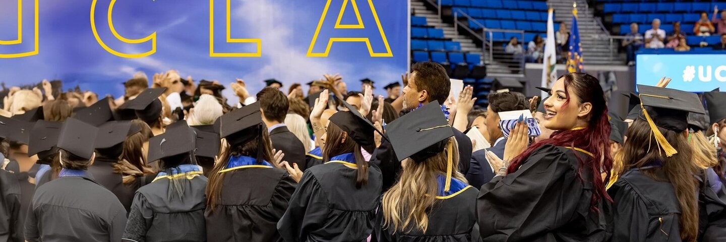 Candid view of graduates from the UCLA Extension 2024 graduation ceremony